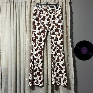 Grace in LA cow print flares. Super soft and comfy.